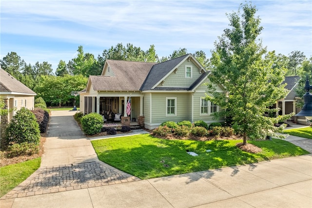 3515 Double Eagle Ln, Opelika, AL 36801 - craftsman-style home featuring covered porch and a front yard