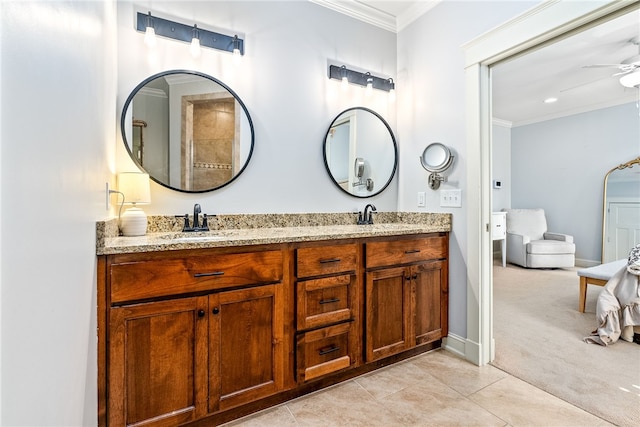 3515 Double Eagle Ln, Opelika, AL 36801 - full bath featuring crown molding, double vanity, ceiling fan, tile patterned floors, and baseboards