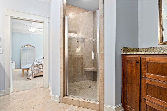 3515 Double Eagle Ln, Opelika, AL 36801 - ensuite bathroom featuring a shower stall, baseboards, and a ceiling fan