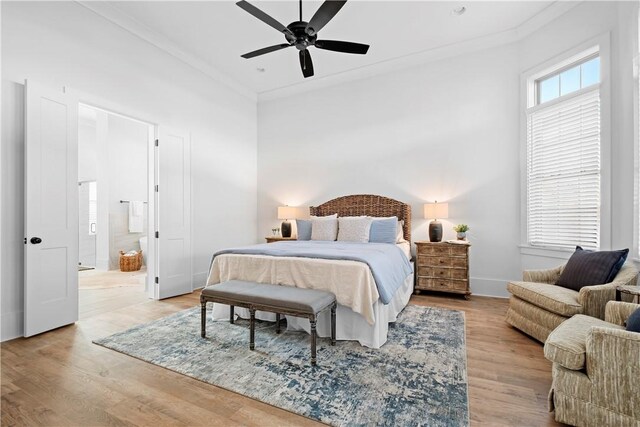 124 Merlin St, Opelika, AL 36801 - bedroom featuring light wood-style floors, connected bathroom, and ceiling fan