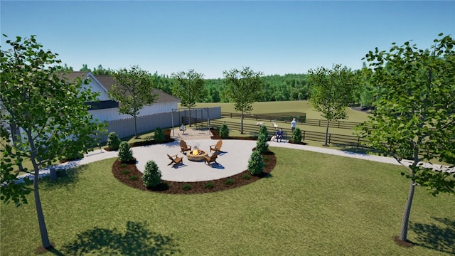 surrounding community with a yard, a rural view, a patio, and a fire pit