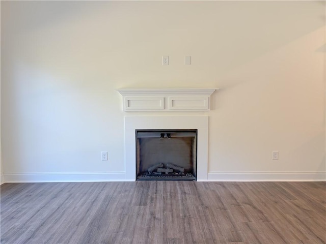 details with hardwood / wood-style floors