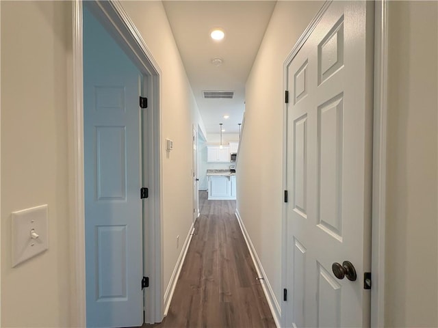 hall featuring dark hardwood / wood-style floors