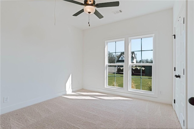1021 Crossing Ct E, Valley, AL 36854 - empty room with plenty of natural light, carpet floors, and ceiling fan