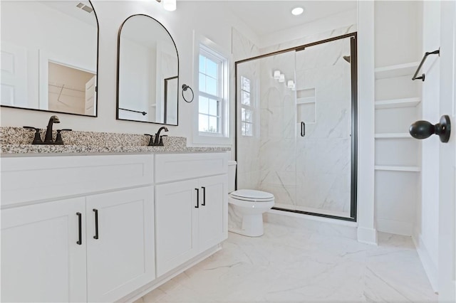 1021 Crossing Ct E, Valley, AL 36854 - bathroom with marble finish flooring, a marble finish shower, double vanity, a walk in closet, and recessed lighting