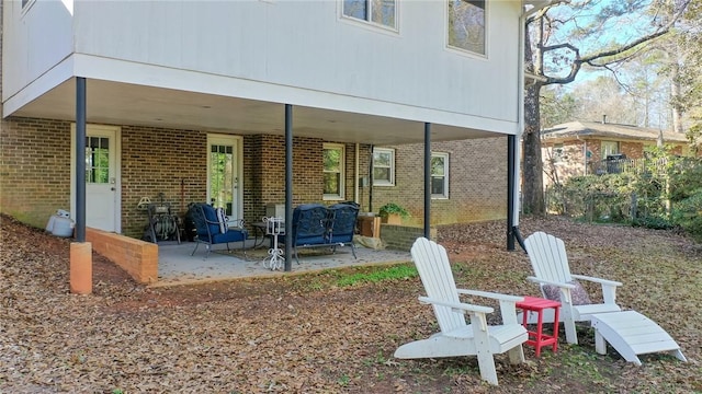 rear view of property with a patio