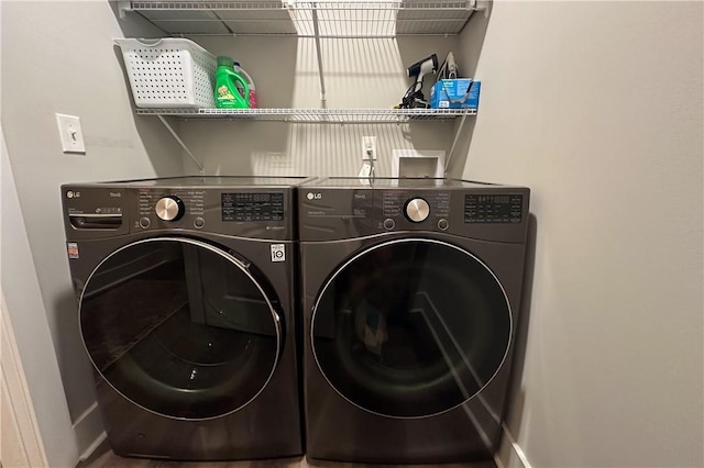 laundry area with laundry area and washing machine and dryer
