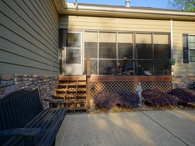 1201 Live Oak Cir, Opelika, AL 36801 - back of house featuring a sunroom