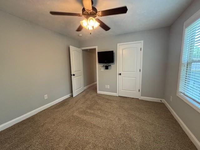1201 Live Oak Cir, Opelika, AL 36801 - unfurnished bedroom featuring carpet floors and a ceiling fan