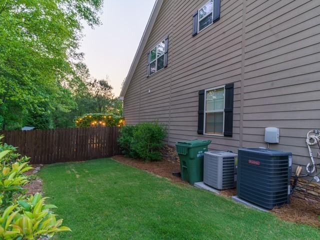 1201 Live Oak Cir, Opelika, AL 36801 - view of yard with central AC unit