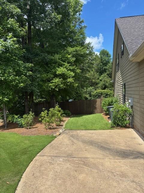 1201 Live Oak Cir, Opelika, AL 36801 - view of yard featuring a patio area