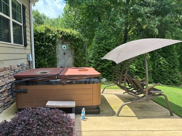 1201 Live Oak Cir, Opelika, AL 36801 - view of patio / terrace with a hot tub