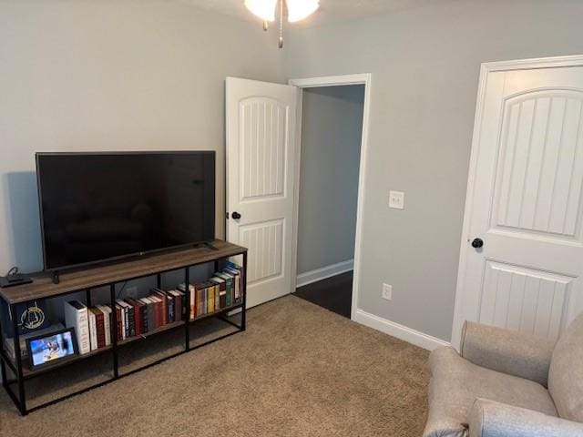 1201 Live Oak Cir, Opelika, AL 36801 - carpeted living area with a ceiling fan and baseboards