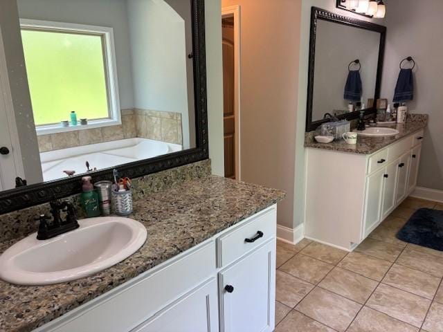 1201 Live Oak Cir, Opelika, AL 36801 - bathroom with vanity, a bath, and tile patterned floors