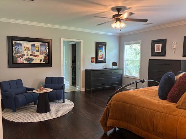 1201 Live Oak Cir, Opelika, AL 36801 - bedroom featuring dark wood finished floors, crown molding, and a ceiling fan