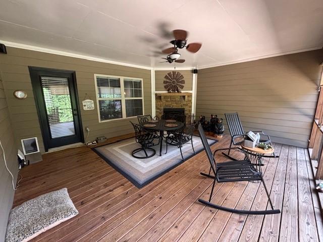 1201 Live Oak Cir, Opelika, AL 36801 - wooden deck with a ceiling fan and outdoor dining space