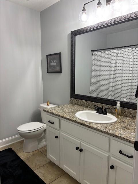 1201 Live Oak Cir, Opelika, AL 36801 - bathroom with vanity and tile patterned flooring