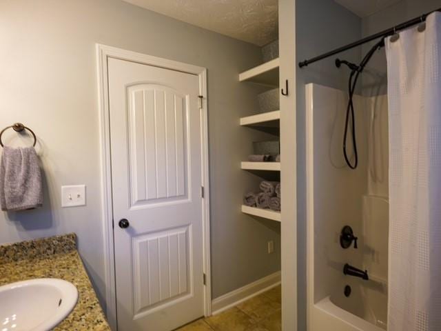 1201 Live Oak Cir, Opelika, AL 36801 - full bathroom featuring shower / bath combo, vanity, and tile patterned floors