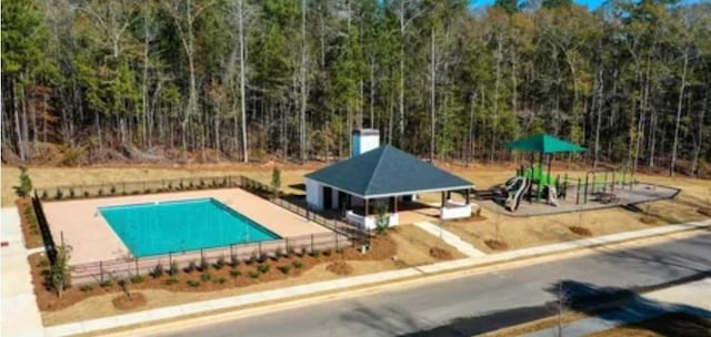 1201 Live Oak Cir, Opelika, AL 36801 - community pool with a wooded view