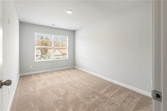 view of carpeted spare room