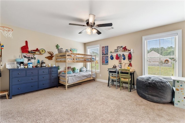 bedroom with visible vents, a ceiling fan, carpet, and baseboards