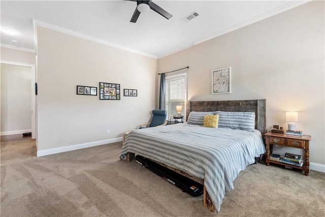 carpeted bedroom with crown molding, baseboards, and visible vents