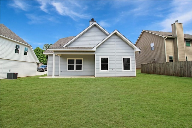 363 Lightness Dr, Auburn, AL 36832 - rear view of house with a yard, fence, and cooling unit