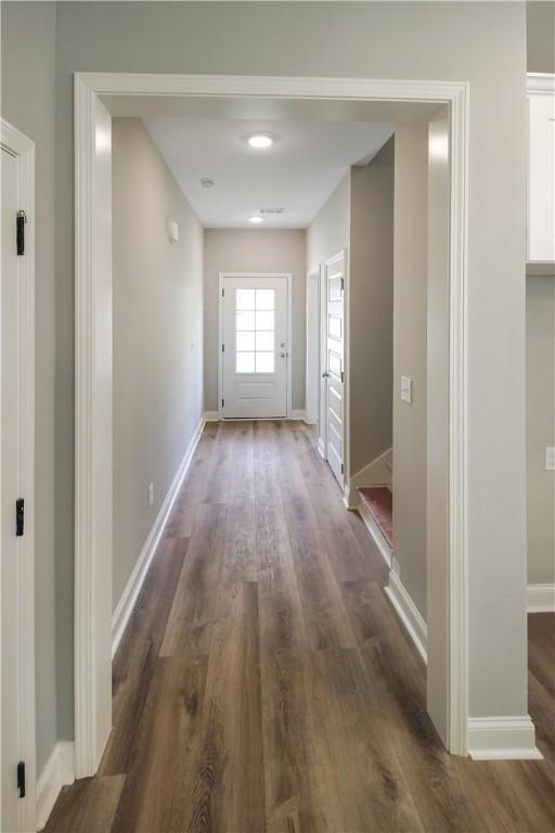 363 Lightness Dr, Auburn, AL 36832 - hall with baseboards and dark wood finished floors