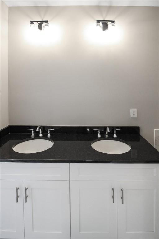 363 Lightness Dr, Auburn, AL 36832 - bathroom featuring double vanity and a sink