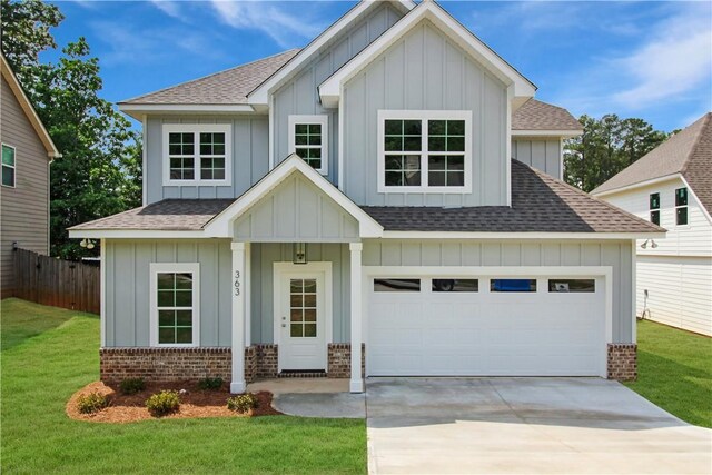 363 Lightness Dr, Auburn, AL 36832 - modern farmhouse style home featuring fence, roof with shingles, brick siding, board and batten siding, and concrete driveway