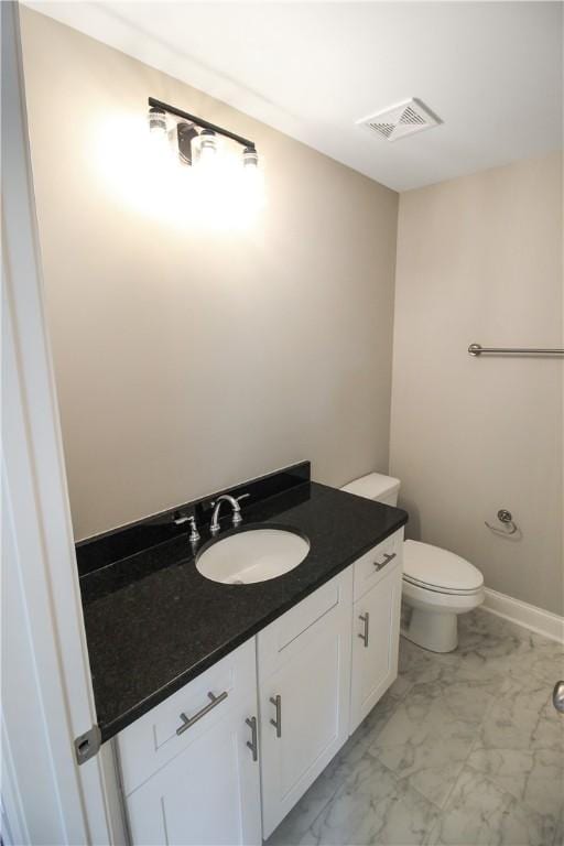 363 Lightness Dr, Auburn, AL 36832 - half bathroom with vanity, toilet, marble finish floor, and visible vents