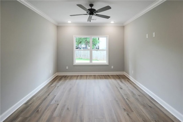 363 Lightness Dr, Auburn, AL 36832 - spare room featuring baseboards, ceiling fan, crown molding, and wood finished floors