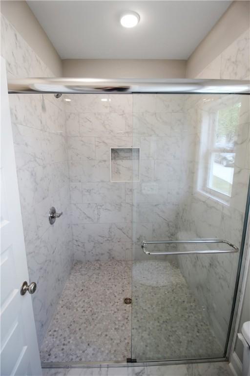 363 Lightness Dr, Auburn, AL 36832 - full bathroom with toilet and a shower stall