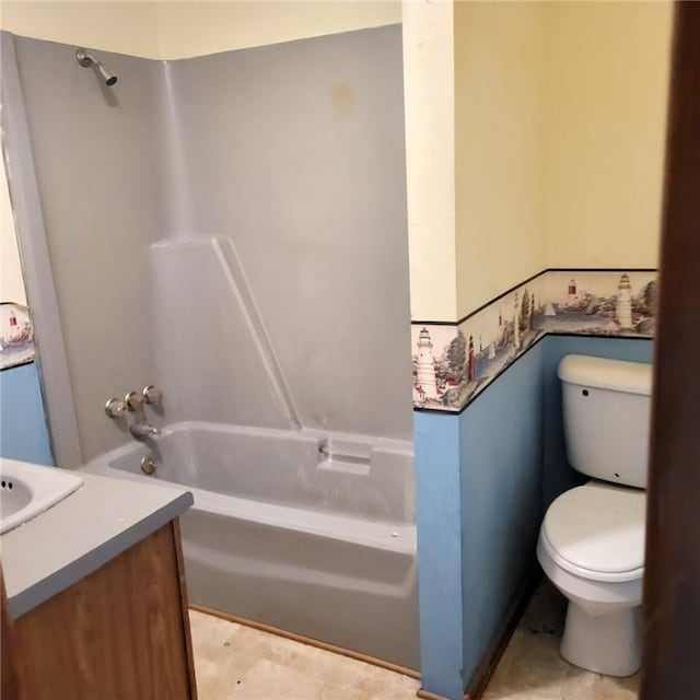 full bathroom featuring vanity, toilet, and bathing tub / shower combination