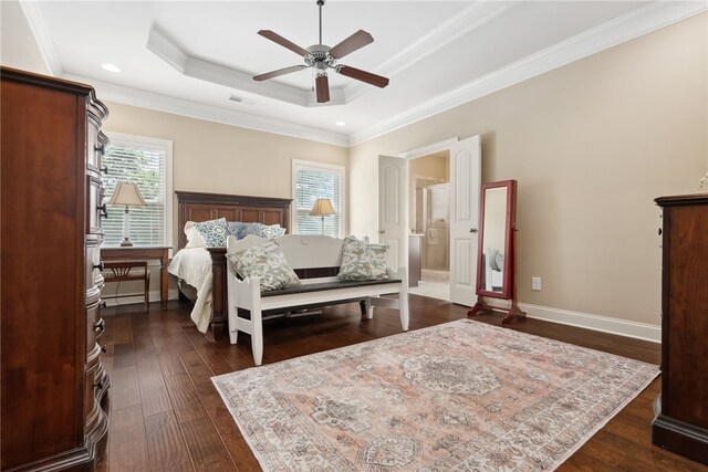 1107 Hampstead Ln, Opelika, AL 36801 - bedroom with multiple windows, a raised ceiling, dark wood-type flooring, crown molding, and baseboards