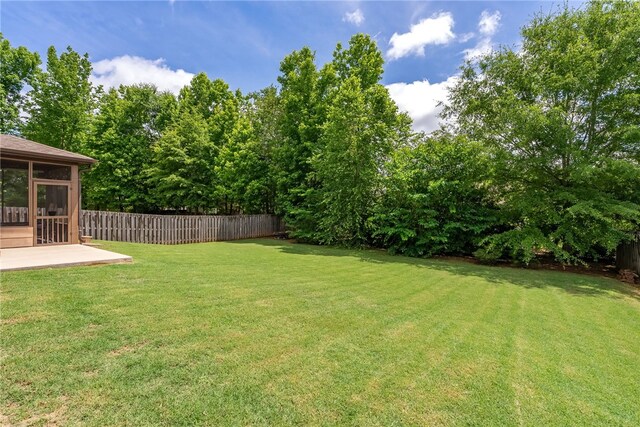 1107 Hampstead Ln, Opelika, AL 36801 - view of yard with a sunroom and a patio