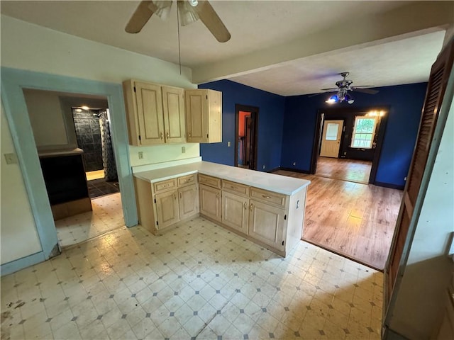 202 E Railroad St, Valley, AL 36854 - kitchen with ceiling fan, light countertops, light brown cabinets, light floors, and beamed ceiling