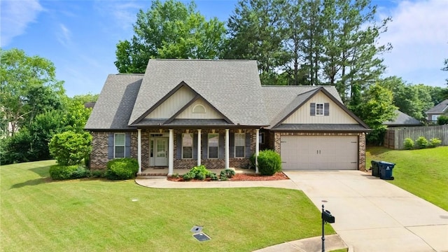 1951 Yearling Ct, Auburn, AL 36830 - craftsman house featuring covered porch, an attached garage, concrete driveway, and brick siding