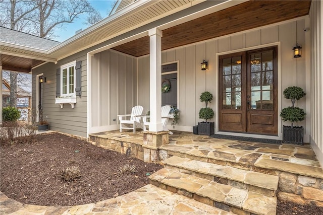 doorway to property with french doors and a porch