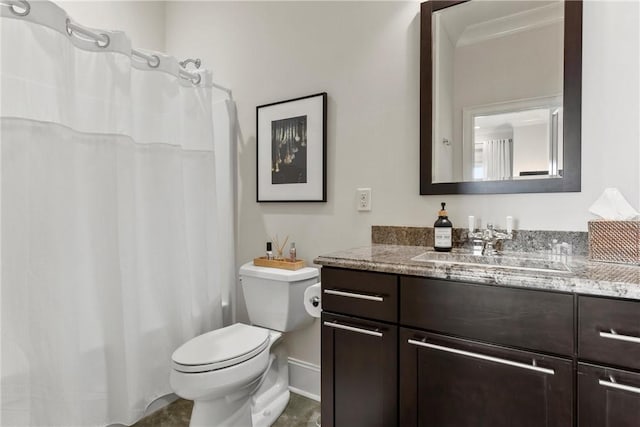 bathroom featuring vanity, toilet, and a shower with shower curtain