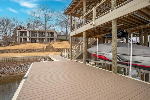 dock area with a water view