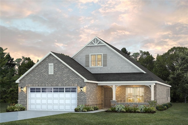 view of front facade featuring a lawn and a garage