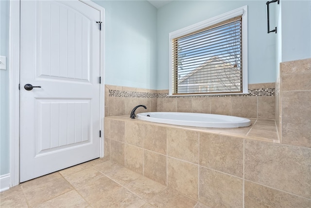 bathroom featuring a bath and tile patterned floors