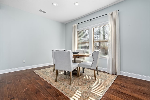 dining area with wood-type flooring, visible vents, baseboards, and recessed lighting