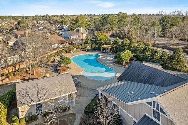 community pool with a patio and a gazebo