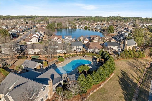 birds eye view of property featuring a residential view and a water view