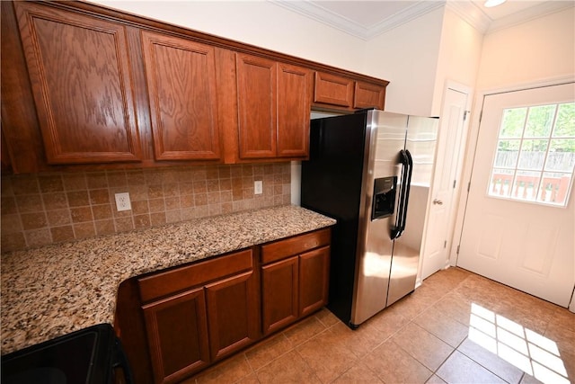2472 Waterstone Cir, Auburn, AL 36832 - kitchen featuring stainless steel fridge, tasteful backsplash, light tile patterned floors, ornamental molding, and light stone counters