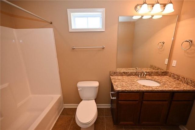 full bathroom with tile patterned flooring, vanity, shower / tub combination, and toilet