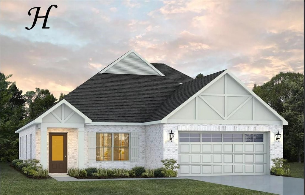 2691 Cantera Ct, Auburn, AL 36830 - view of front of house featuring driveway, a front yard, an attached garage, and roof with shingles