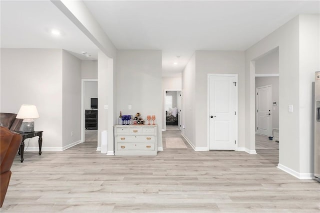 living room with light hardwood / wood-style floors